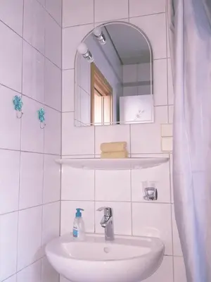 Ein Badezimmer in der Unterkunft Ferienwohnung