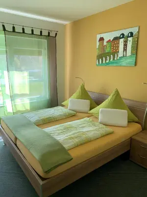 Ein Bett oder Betten in einem Zimmer der Unterkunft Park-Hotel Leimen
