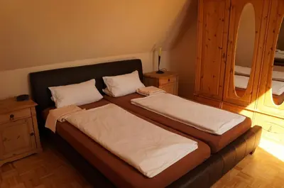 Ein Bett oder Betten in einem Zimmer der Unterkunft Nibelungen - Ferienwohnungen - Worms - Apartments