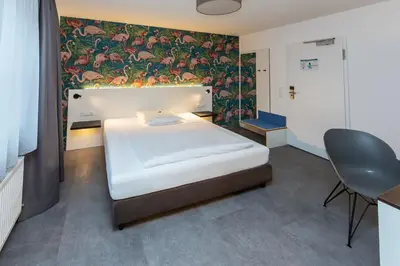 Ein Bett oder Betten in einem Zimmer der Unterkunft Gottwalds Inn