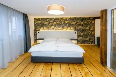 Ein Bett oder Betten in einem Zimmer der Unterkunft Gottwalds Inn
