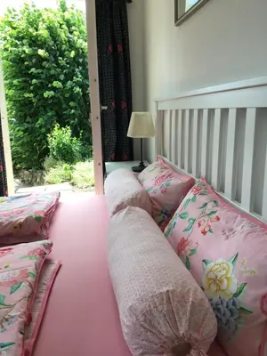 Ein Bett oder Betten in einem Zimmer der Unterkunft Pension Malwine