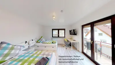 Ein Bett oder Betten in einem Zimmer der Unterkunft Apartments Mosbach