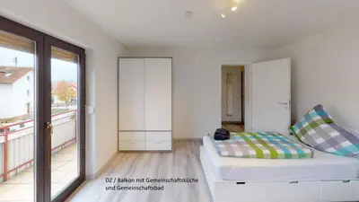 Ein Bett oder Betten in einem Zimmer der Unterkunft Apartments Mosbach