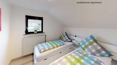 Ein Bett oder Betten in einem Zimmer der Unterkunft Apartments Mosbach