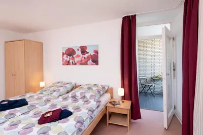 Ein Bett oder Betten in einem Zimmer der Unterkunft Abendrot Appartement