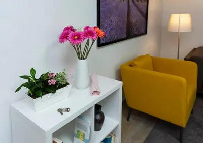 Ein Sitzbereich in der Unterkunft Blumenmeer Appartment