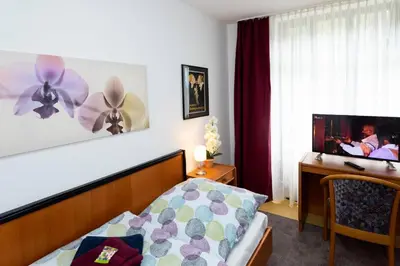 Ein Bett oder Betten in einem Zimmer der Unterkunft Morgentau Appartement