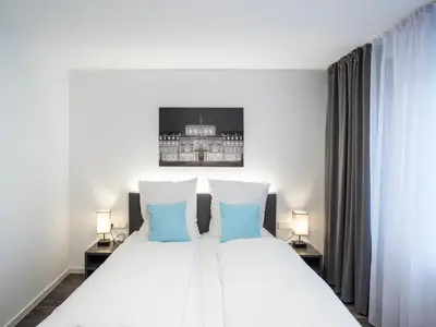 Ein Bett oder Betten in einem Zimmer der Unterkunft Mood contemporary living