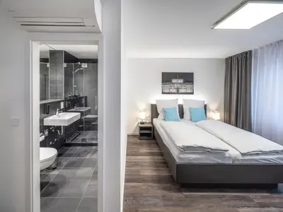 Ein Bett oder Betten in einem Zimmer der Unterkunft Mood contemporary living