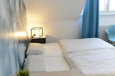 Ein Bett oder Betten in einem Zimmer der Unterkunft Pforzheim Ferienhaus