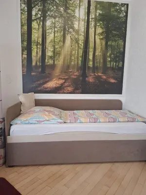 Ein Bett oder Betten in einem Zimmer der Unterkunft Exclusive Apartments