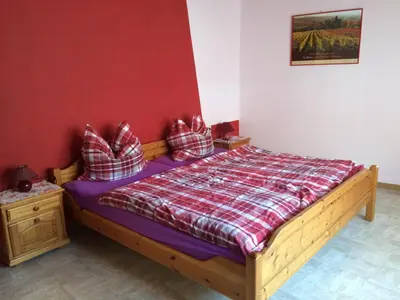 Ein Bett oder Betten in einem Zimmer der Unterkunft Weingut & Gästehaus Nagel