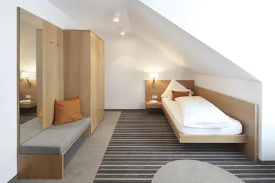 Ein Bett oder Betten in einem Zimmer der Unterkunft Hotel Hiller in Abstatt
