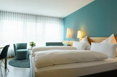 Ein Bett oder Betten in einem Zimmer der Unterkunft Hotel Hiller in Abstatt