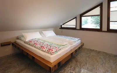 Ein Bett oder Betten in einem Zimmer der Unterkunft Gästehaus Alte Glaserei