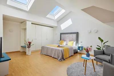 Ein Bett oder Betten in einem Zimmer der Unterkunft SEEGER Living Premium Downtown