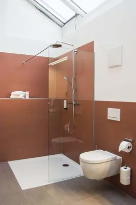 Ein Badezimmer in der Unterkunft SEEGER Living Premium Downtown