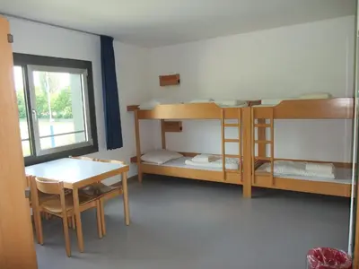 Ein Bett oder Betten in einem Zimmer der Unterkunft Jugendherberge Heidelberg International