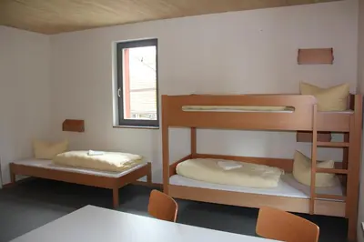 Ein Bett oder Betten in einem Zimmer der Unterkunft Jugendherberge Heidelberg International