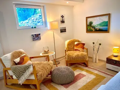 Ein Sitzbereich in der Unterkunft Schwarzwald Boutique-Apartment HAUS REHGARTEN