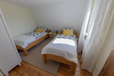 Ein Bett oder Betten in einem Zimmer der Unterkunft Ferienhaus Palatini