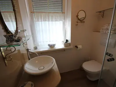 Ein Badezimmer in der Unterkunft No.31 B&B im Rosengarten