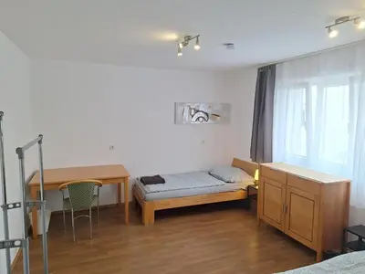 Ein Bett oder Betten in einem Zimmer der Unterkunft Appartement Confidence, Monteurwohnung