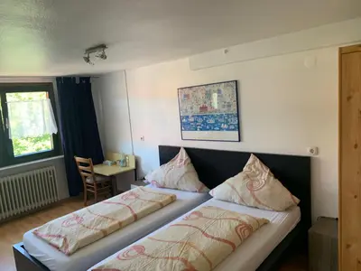 Ein Bett oder Betten in einem Zimmer der Unterkunft Landgasthaus Klosterhof