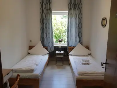 Ein Bett oder Betten in einem Zimmer der Unterkunft Landgasthaus Klosterhof