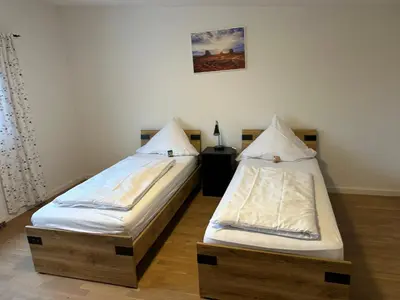 Ein Bett oder Betten in einem Zimmer der Unterkunft Landgasthaus Klosterhof
