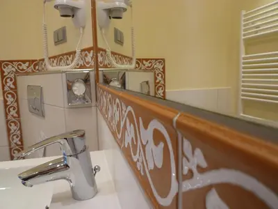 Ein Badezimmer in der Unterkunft Gästehaus Deidesheim