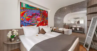 Ein Bett oder Betten in einem Zimmer der Unterkunft PLAZA INN Bad Rappenau