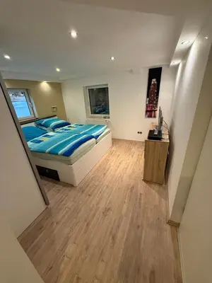 Ein Bett oder Betten in einem Zimmer der Unterkunft Idyllische und ruhig gelegene 1ZKB Wohnung in Ludwigshafen am Rhein