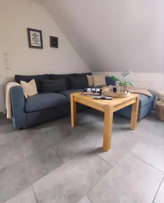 Ein Sitzbereich in der Unterkunft Ferienwohnung Scheib Aspach