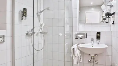 Ein Badezimmer in der Unterkunft Hotel Restaurant Krokodil