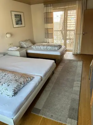 Ein Bett oder Betten in einem Zimmer der Unterkunft Apartment am Rathaus 3SZ