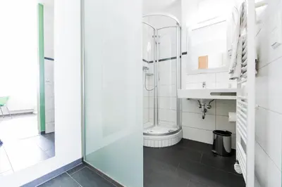 Ein Badezimmer in der Unterkunft Gästehaus zur Post