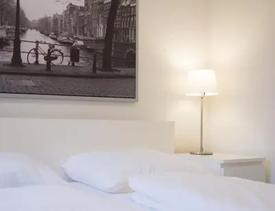 Ein Bett oder Betten in einem Zimmer der Unterkunft Hotel Krone Zentrum