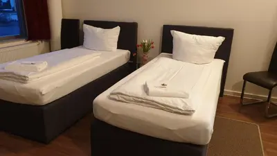 Ein Bett oder Betten in einem Zimmer der Unterkunft Apart-Hotel-Kick