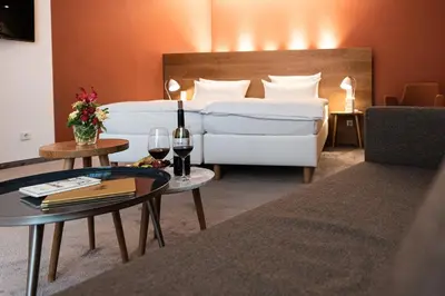 Ein Bett oder Betten in einem Zimmer der Unterkunft Hotel Adler Asperg