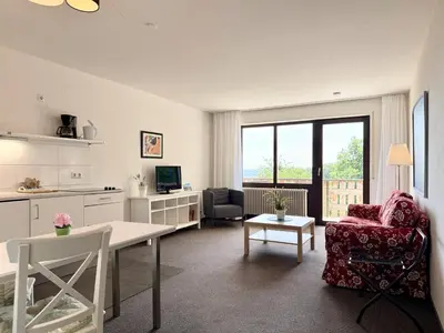 Ein Sitzbereich in der Unterkunft Kastanienhof Apartment Hotel