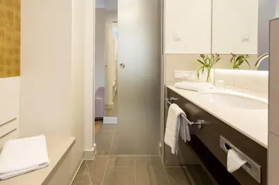 Ein Badezimmer in der Unterkunft EMICH´S Hotel