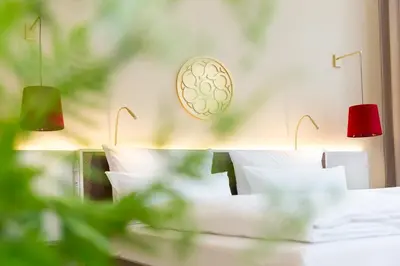 Ein Bett oder Betten in einem Zimmer der Unterkunft EMICH´S Hotel