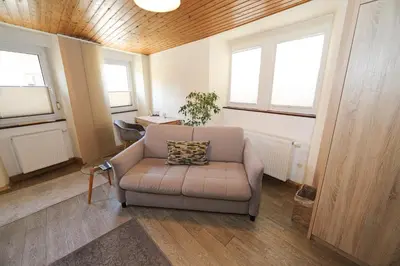 Ein Sitzbereich in der Unterkunft Gästehaus Villa Wernz