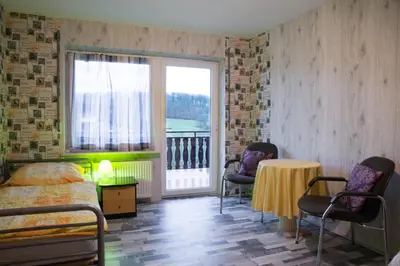 Ein Sitzbereich in der Unterkunft Monteurzimmer Rabe