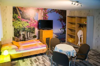 TV/Unterhaltungsangebot in der Unterkunft Monteurzimmer Rabe