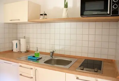 Küche/Küchenzeile in der Unterkunft D & S Hotel & Ferienwohnungen