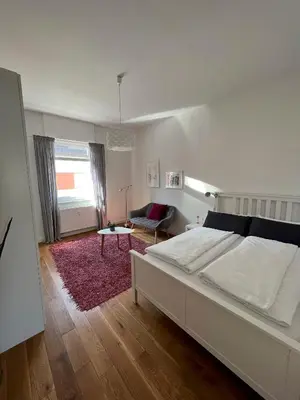 Ein Bett oder Betten in einem Zimmer der Unterkunft Feel-Good Apartment In Mannheim-Neckarau