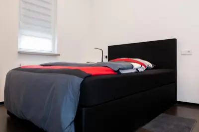Ein Bett oder Betten in einem Zimmer der Unterkunft Zimmervermietung Dietzenbach